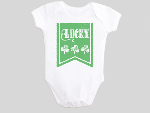 Lucky St. Patrick's Day Baby Bodysuit with Irish Shamrock Clovers on a Green Banner